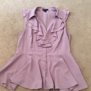 Sleeveless, ruffled, peplum blouse